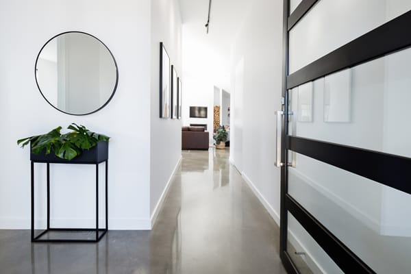 A hallway leading to a living area