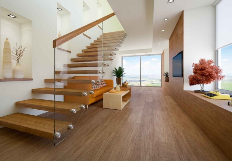 A home interior featuring a view of the living area and staircase, with timber flooring and modern, stylish furnishings.
