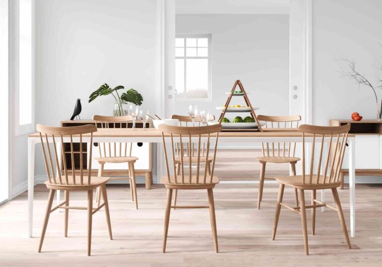 A bright dining area with contemporary furnishings and light coloured flooring.