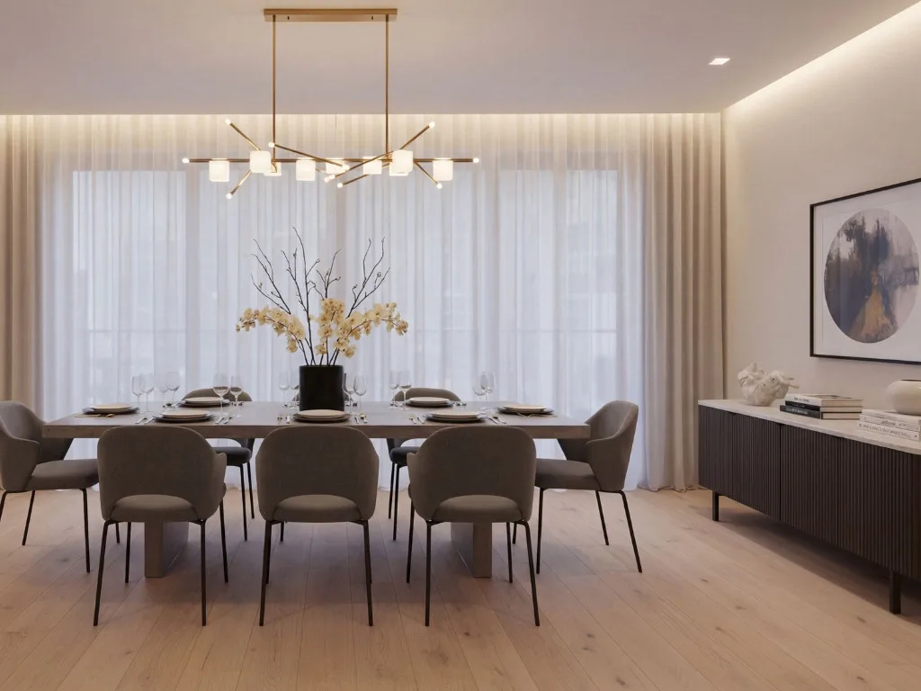 Contemporary dining room featuring a wooden table with six upholstered chairs, brass pendant lighting fixture, black orchid centerpiece, and floor-to-ceiling white curtains with recessed ceiling li...